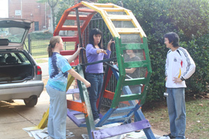 Photo of students working on science project